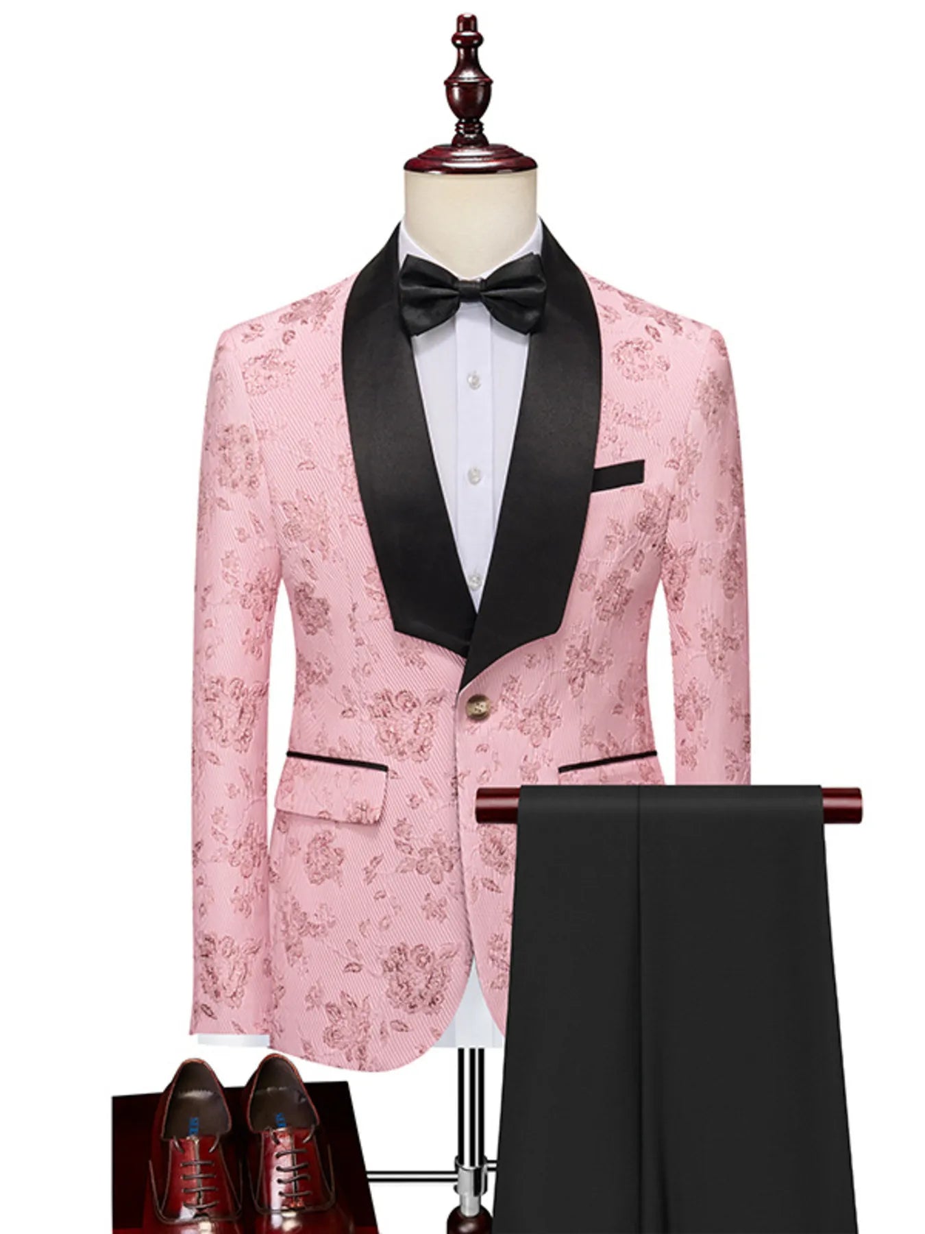 Trendsi pink floral blazer and pants set with black lapel, white shirt, black bow tie, and matching black pants