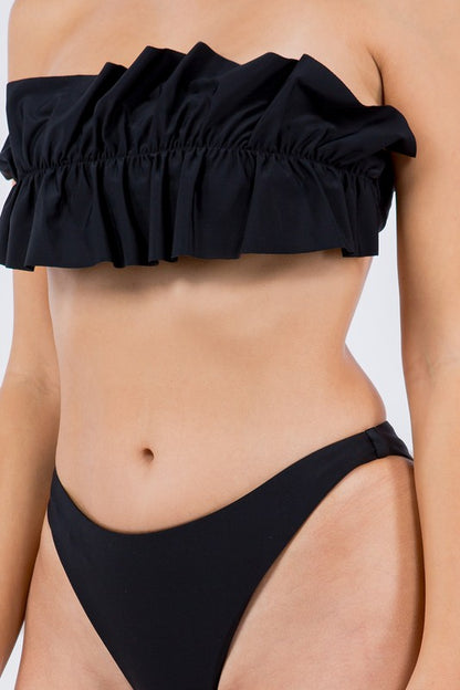 Close-up of Mermaid Swimwear Black Ruffle bandeau bikini top with matching black bottoms