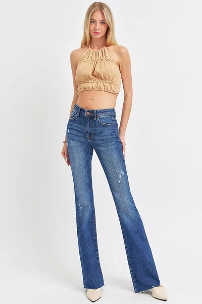 Trendsi Mid Rise Flare Jeans in Blue Denim, styled with a fitted crop top and heels