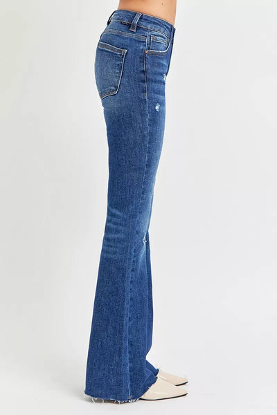 Stylish side view of Mid Rise Flare Jeans in blue denim with a distressed finish and tailored fit