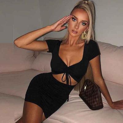 Stylish black mini dress with tie front detail and bodycon fit for a chic evening look