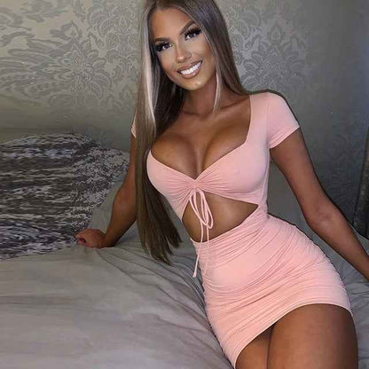 CJ Mini Dress in Light Pink with Cut-Out Design and Tie Front Detail for a Stylish Look