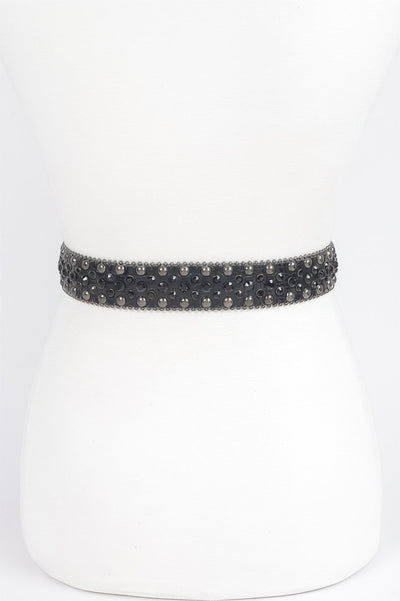 Black rhinestone studded metal belt with gunmetal studs and woven design displayed on white mannequin