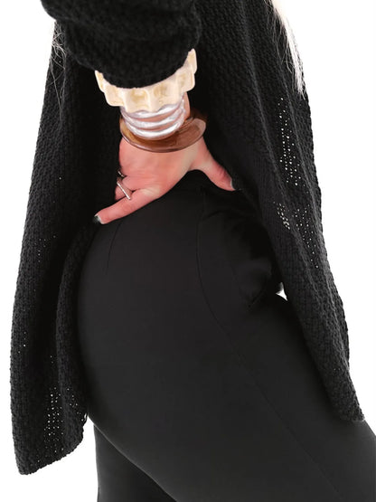 Trendsi Oversized Knit Cardigan open textured black knit shown on model with black leggings and bangles