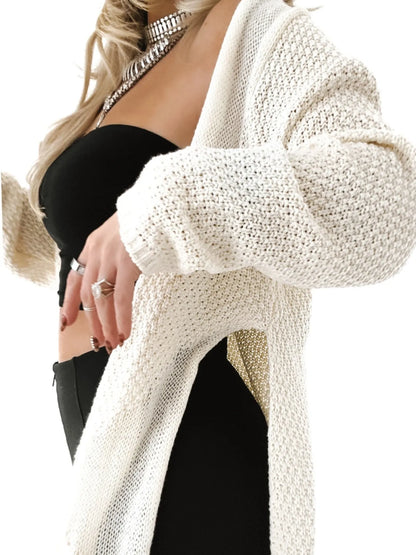 Trendsi Oversized Knit Cardigan in cream open front chunky knit with side slit worn over black top