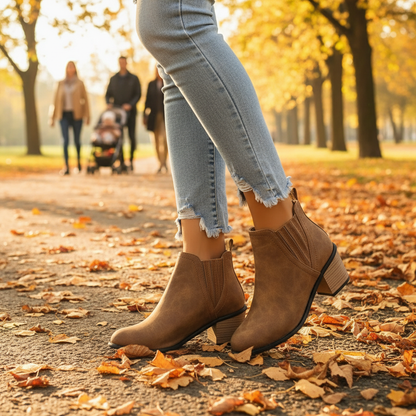 Point toe block heels boots brown waist down autumn park