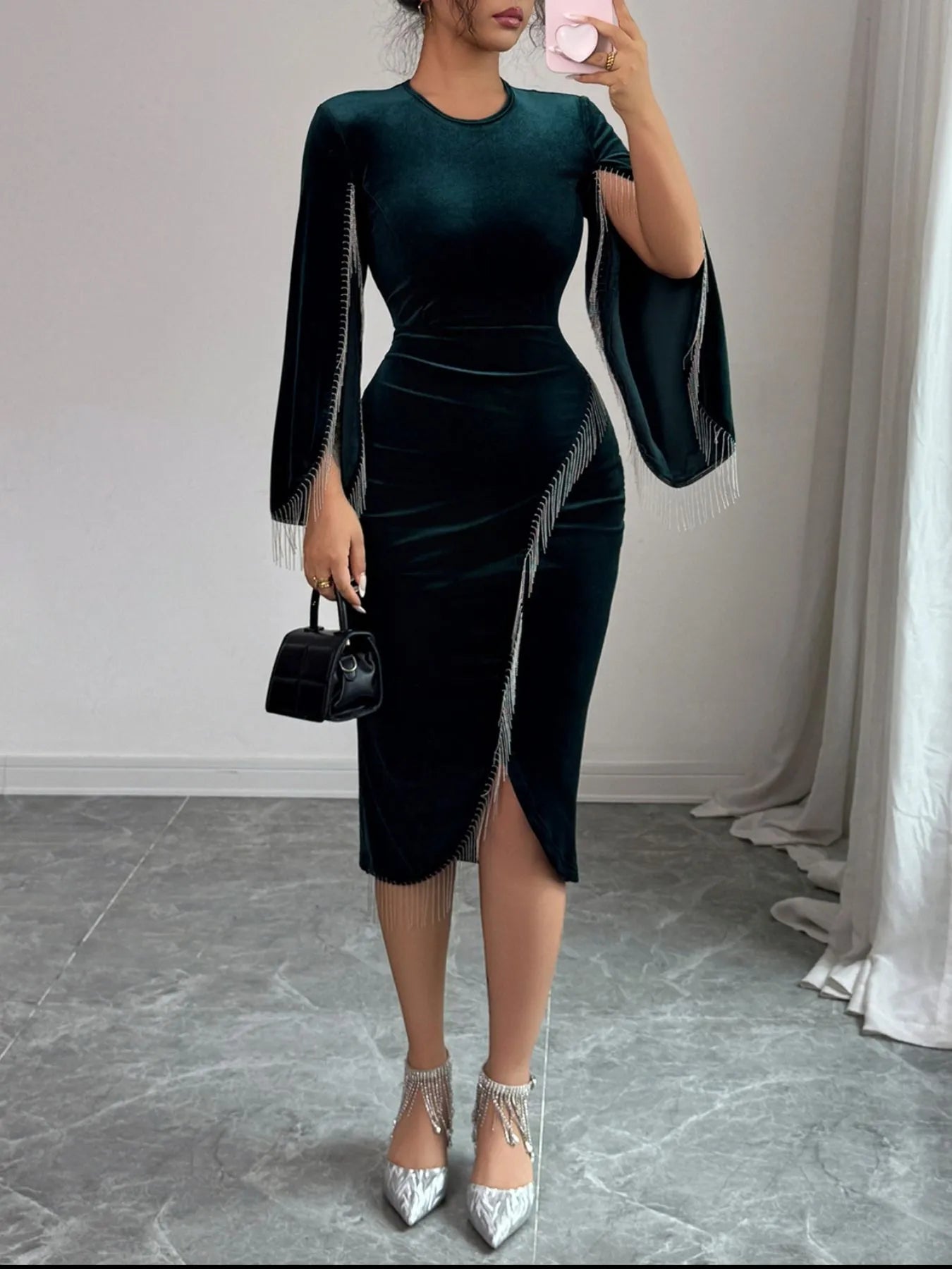 Elegant Round Neck Midi Dress in dark green velvet with fringe detailing and a stylish slit