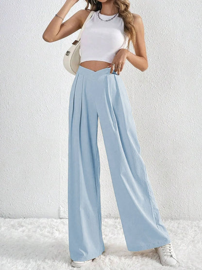 Trendsi Ruched Pants in light blue with a wide-leg design, paired with a white crop top for a stylish look