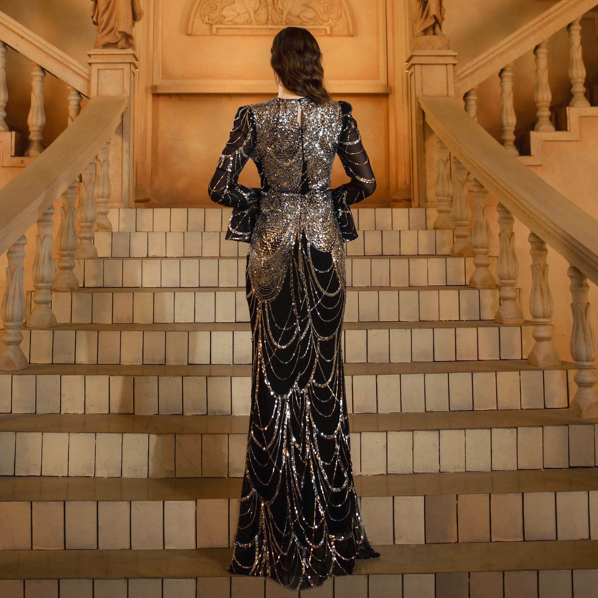 Elegant Sequined Fishtail Wedding Dress with a dramatic back, perfect for a stunning bridal look