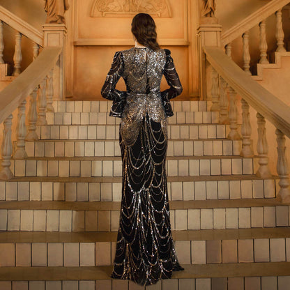 Elegant Sequined Fishtail Wedding Dress with a dramatic back, perfect for a stunning bridal look