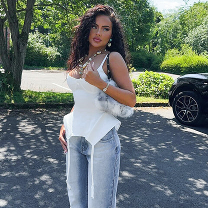 Trendsi white Boning Corset Top with straps worn by model with jeans and statement necklace outdoors