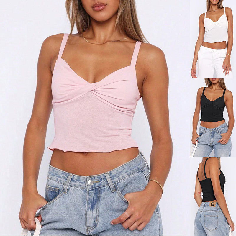 Trendsi Y2K V-neck camisole top in pink with twist front crop thin straps paired with light wash jeans