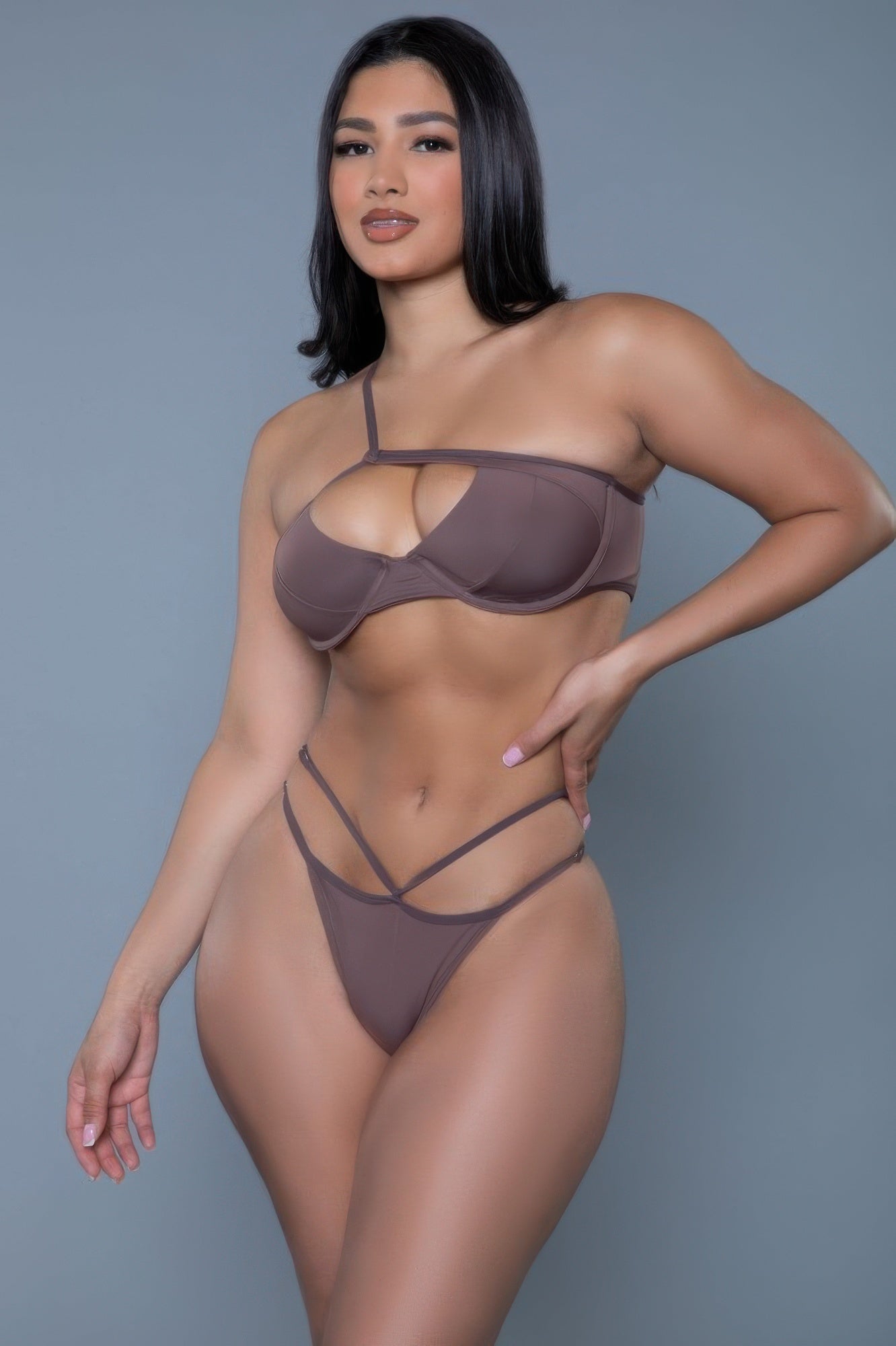CCWHOLESALECLOTHING strappy brown bikini set with asymmetrical cutout top and double strap high cut bottoms on model