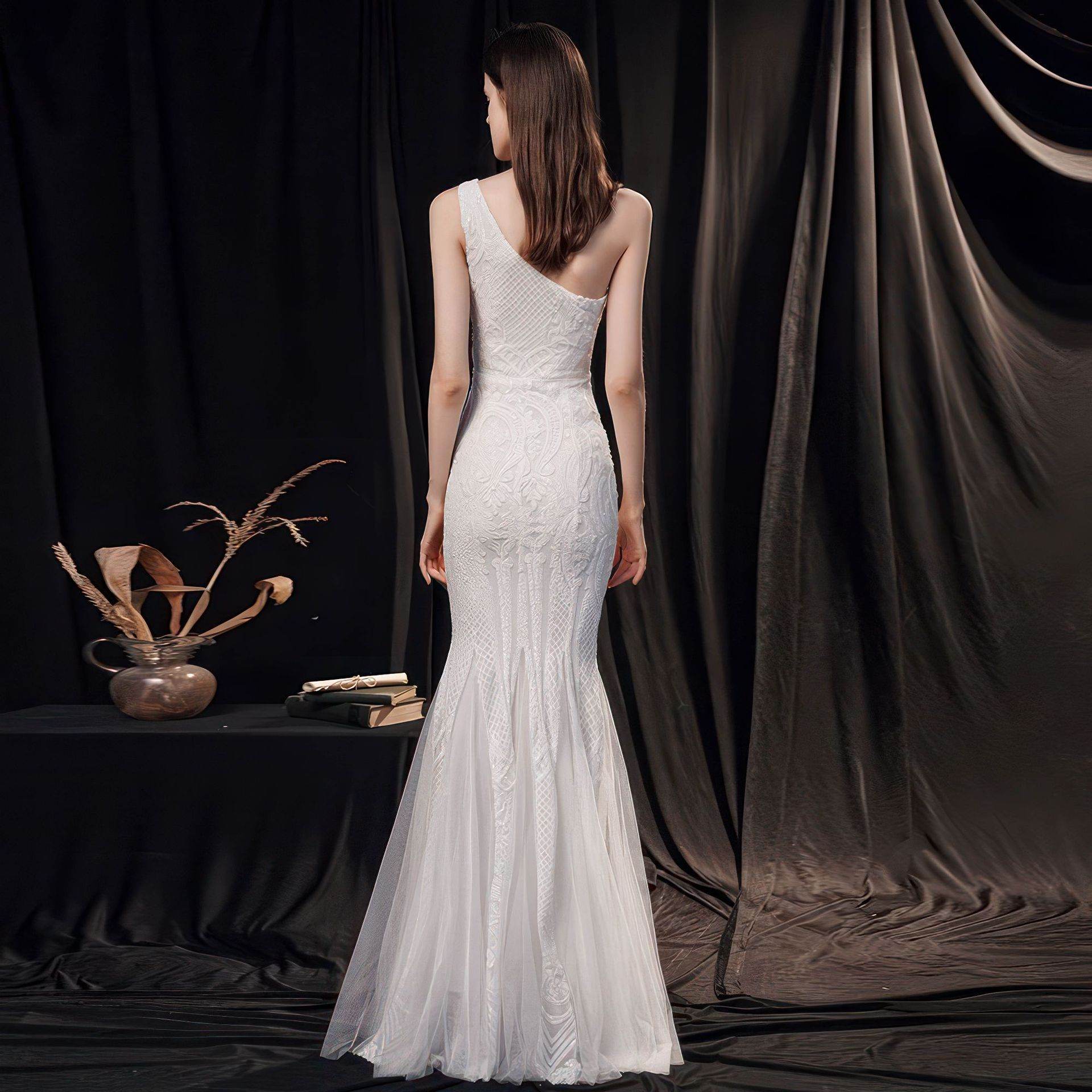 Elegant Slimming Fishtail Wedding Dress with intricate lace details and a one-shoulder design