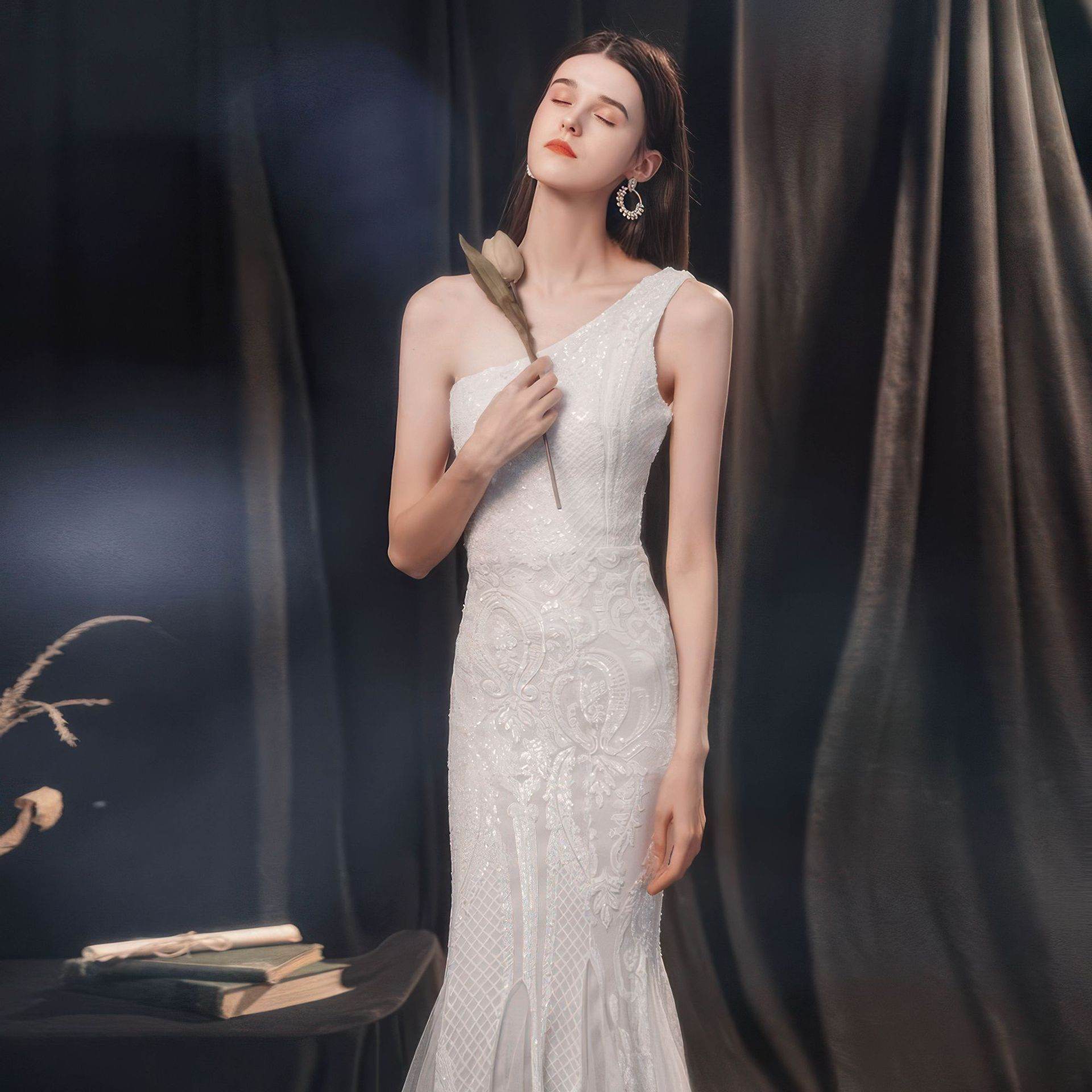 Elegant one-shoulder Slimming Fishtail Wedding Dress featuring intricate lace detailing