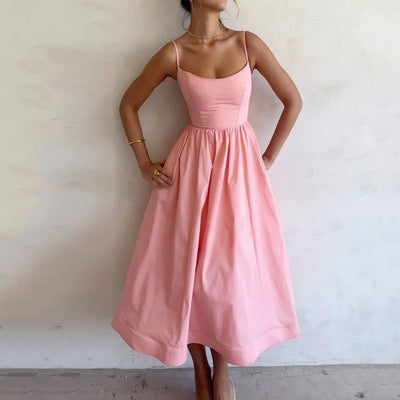 Trendsi solid color summer maxi dress in pink with spaghetti straps and fitted bodice