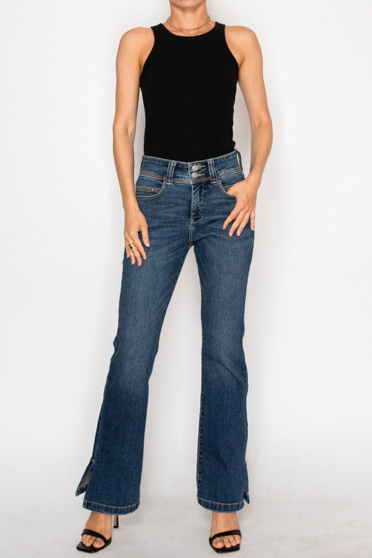 Artemis Vintage High Rise Bootcut Jeans dark blue denim with double button waist and front hem slits