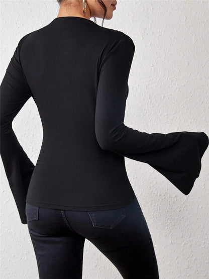Trendsi Fitted T-Shirt black long sleeve with dramatic bell sleeves shown from back on model wearing dark jeans