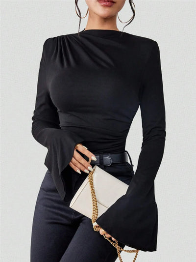 Trendsi black Fitted T-Shirt with long bell sleeves and ruched shoulder styled with belt and white chain clutch