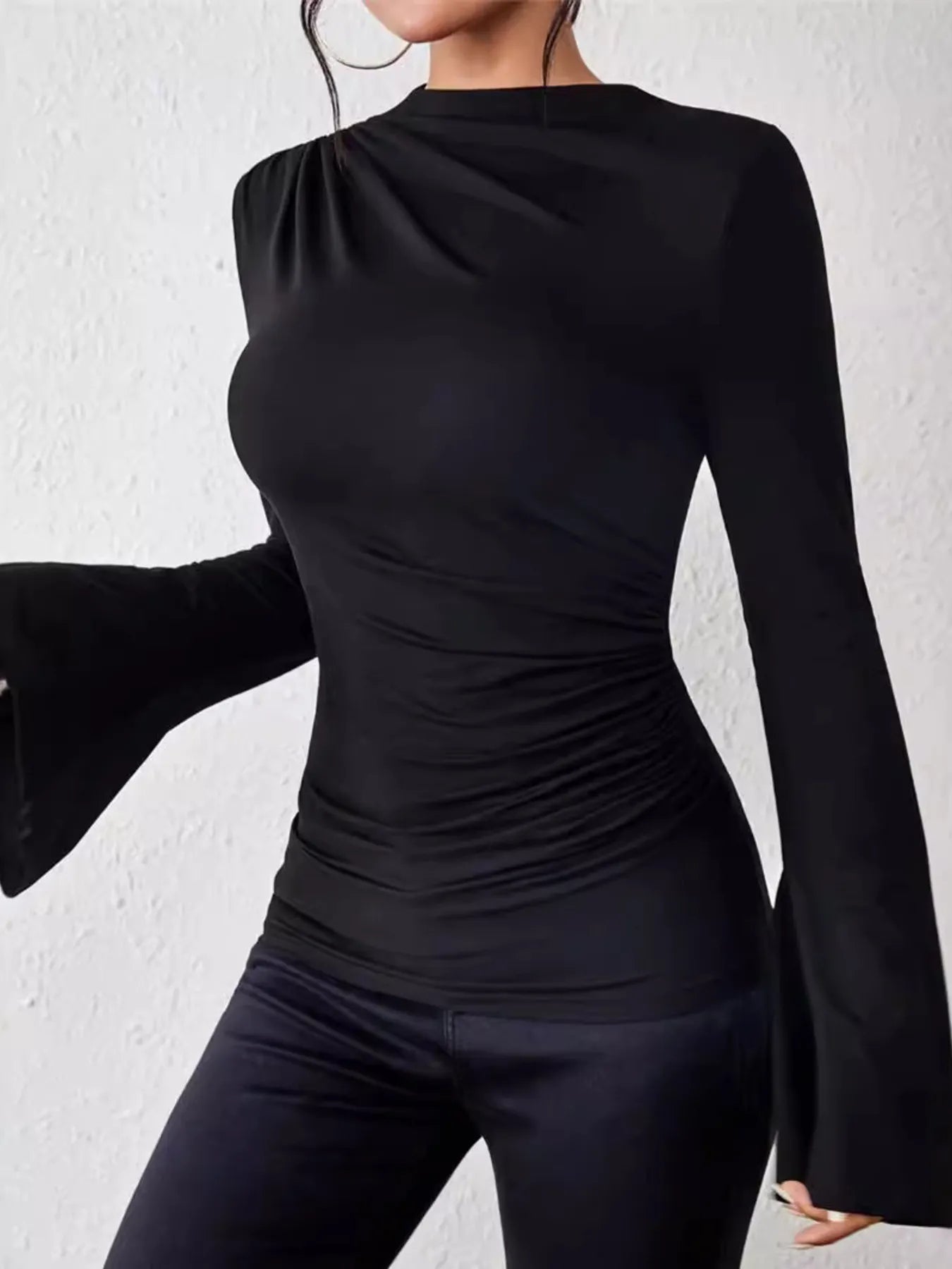 Trendsi black long sleeve Fitted T-Shirt with mock neck ruched waist and bell sleeves on model