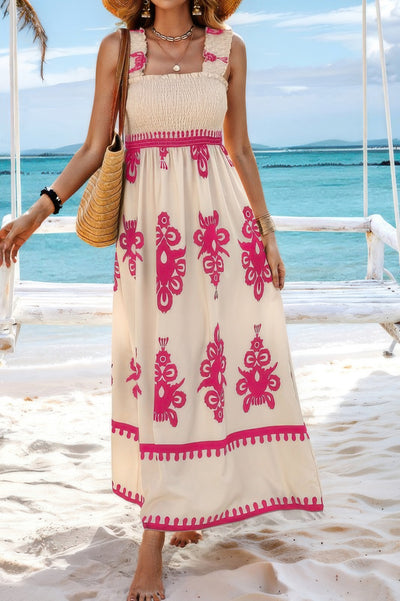 CCWHOLESALECLOTHING sleeveless square neck dress cream maxi with pink floral print smocked bodice and ruffled straps on beach