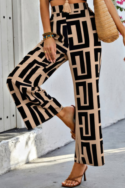High waist black and beige geometric print Wide Leg Loose Pants styled with sandals straw tote and beaded bracelets