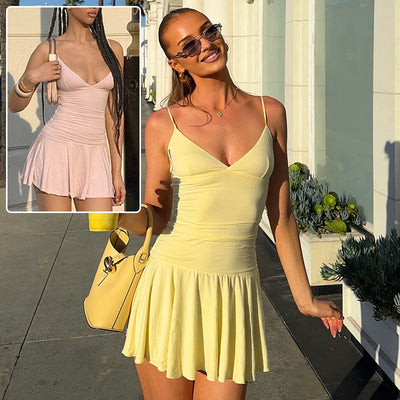 Trendsi Y2K ruffled mini dress in yellow with spaghetti straps and flared hem shown on model plus pink inset