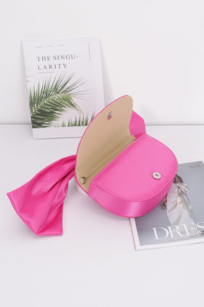 Fun Clutch Bag CCWHOLESALECLOTHING hot pink satin clutch with attached scarf sash open to show beige interior and snap closure
