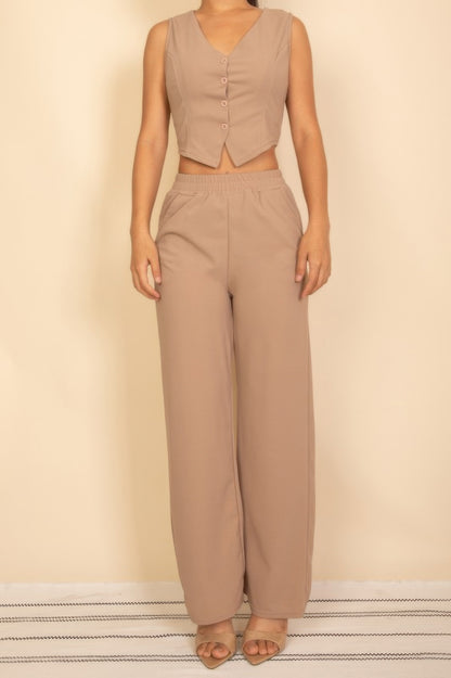 Stylish model wearing a Tailored Button Vest paired with matching wide-leg pants for a chic look