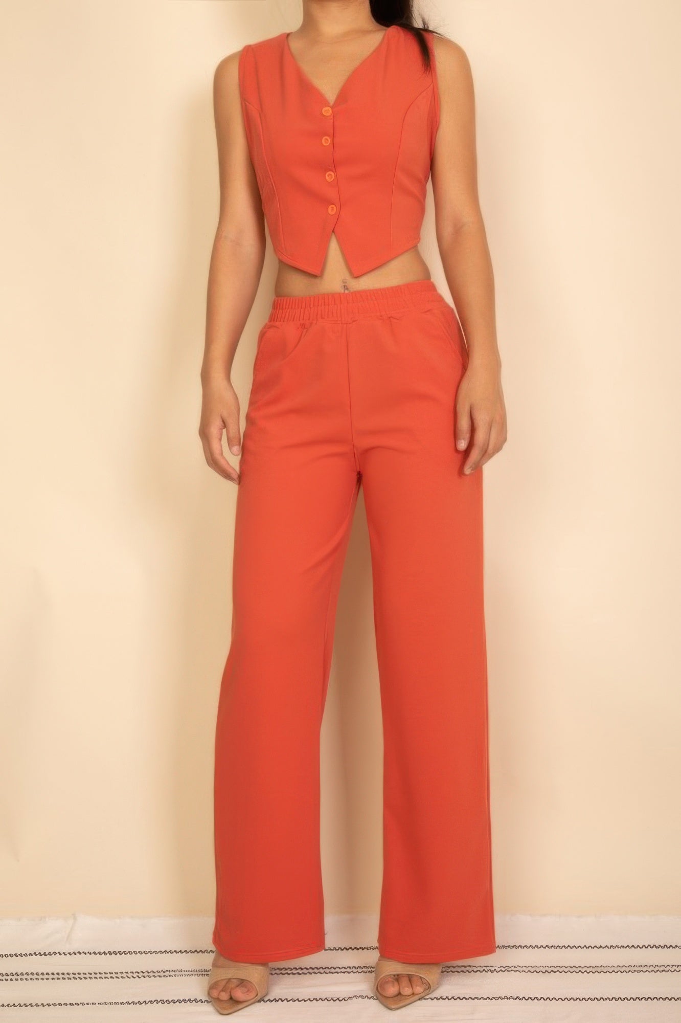 Tailored Button Vest in Coral with Sleek Design, Paired with Matching Wide-Leg Pants
