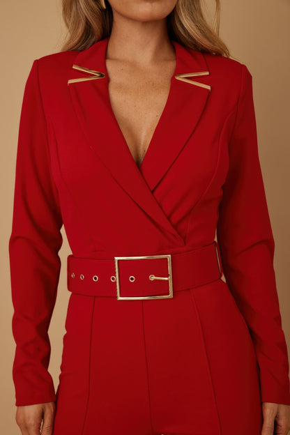 Valentine Tailored Power Suit in vibrant red with a stylish belt and elegant gold accents
