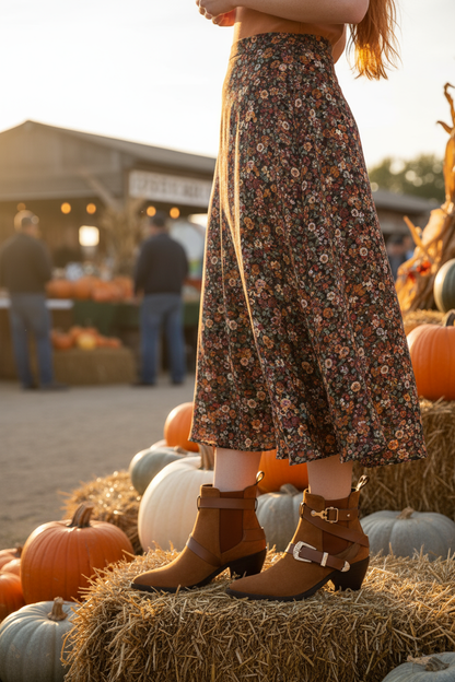 Tan western ankle boots at fall farmers market