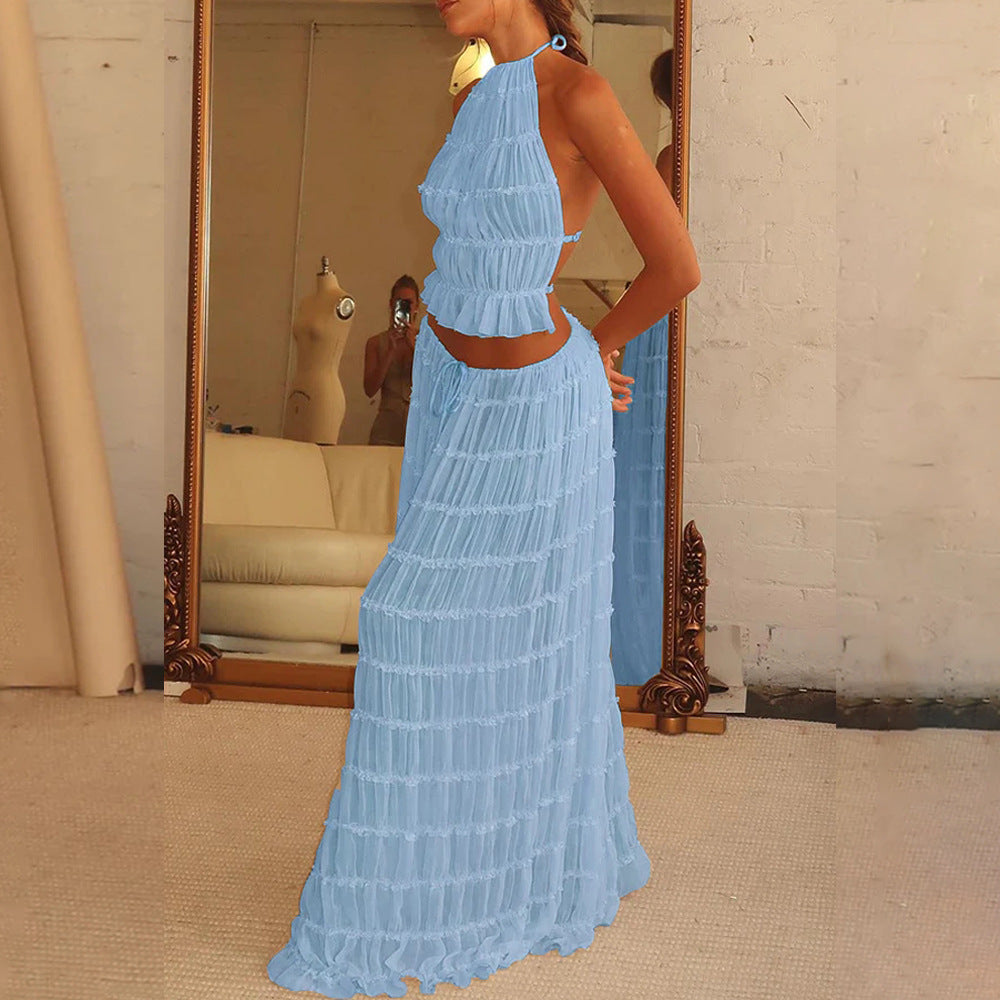 Model wearing a light blue Trendy Halter Top & Maxi Skirt set in a stylish setting
