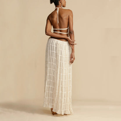 Elegant woman wearing a Trendy Halter Top & Maxi Skirt in a soft fabric with a stylish design