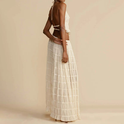 Elegant woman wearing a Trendy Halter Top & Maxi Skirt in a flowing design