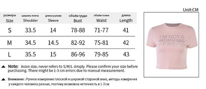 Trendsi pink Crop T-Shirt with IM NOT A MORNING PERSON slogan short sleeves cropped fit and size chart