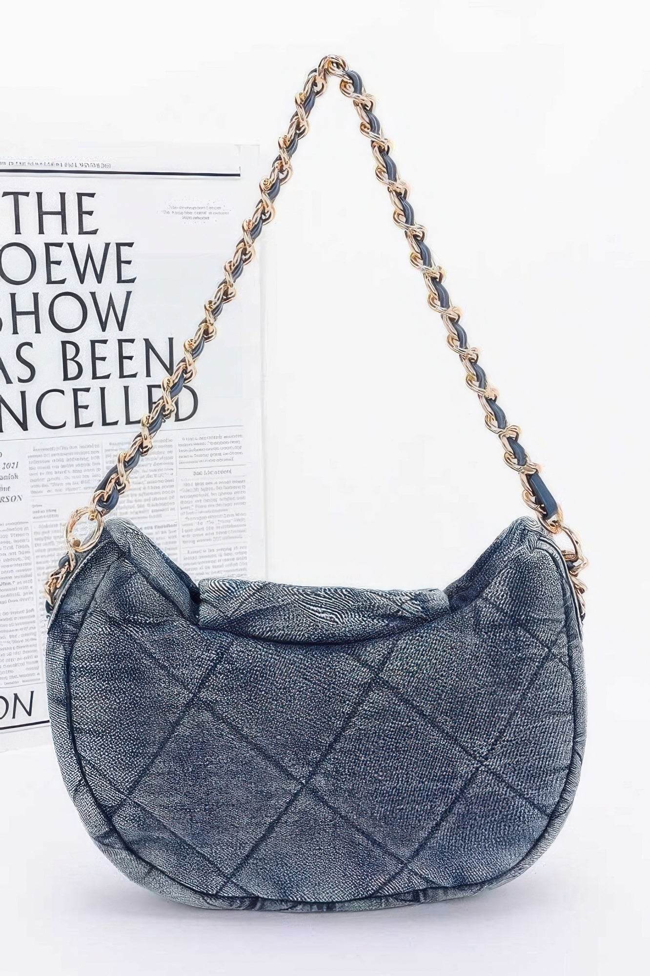 Denim Crossbody Bag quilted crescent shoulder bag in light wash blue denim with gold chain strap