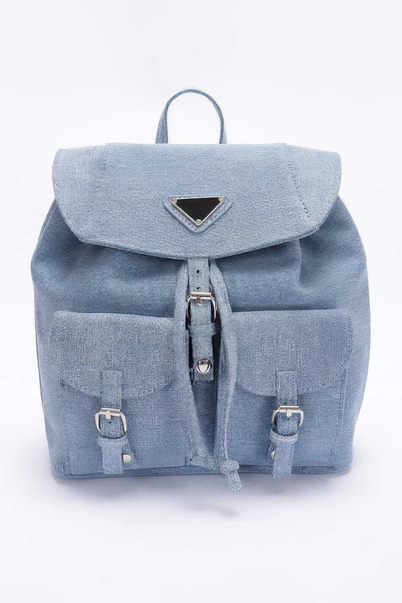 Light blue denim backpack with double pockets front flap drawstring buckle straps and top handle