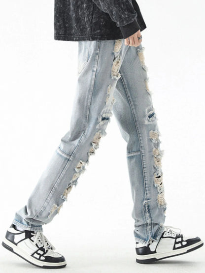 Trendsi men's distressed straight jeans light wash side ripped detail modeled with black sneakers