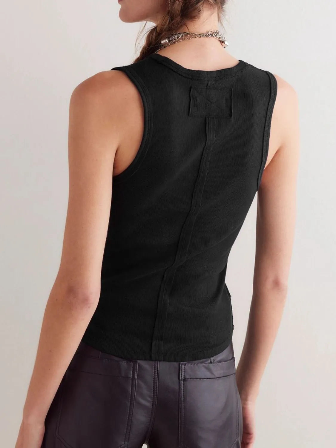 Trendsi V-Neck Tank Top in black, featuring a stylish back design for a modern look