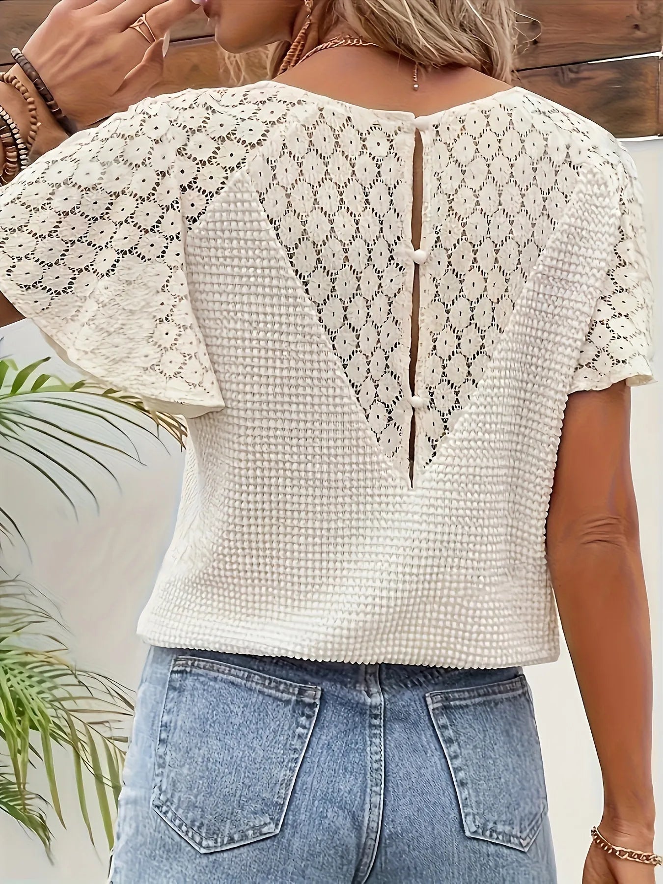 Trendsi Apricot Lace V-Neck top featuring detailed lace sleeves and textured back design in white