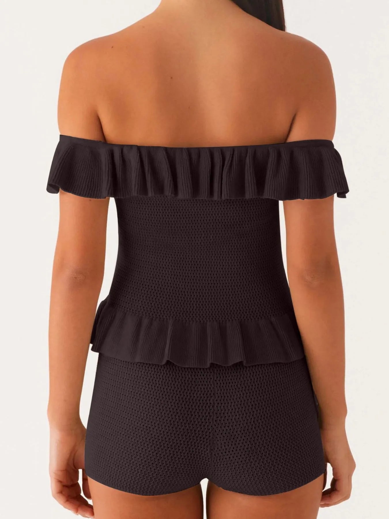 Trendsi black off-shoulder ruffle top with textured fabric and fitted silhouette