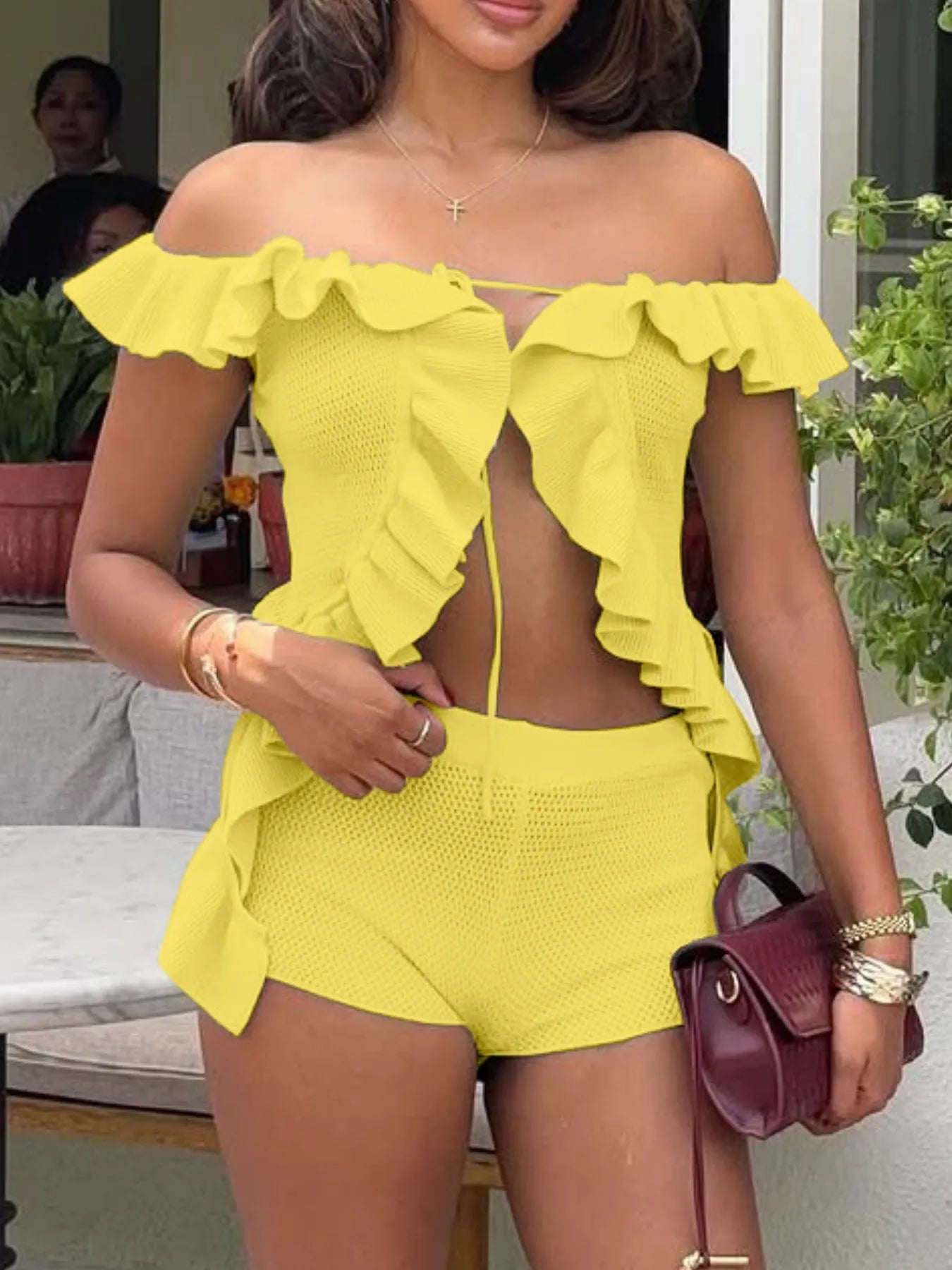 Trendsi Yellow Off-Shoulder Ruffle Top with matching shorts in a casual summer outfit