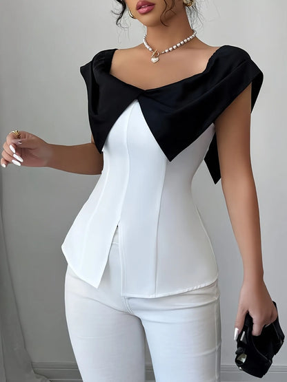 Trendsi white top with black accent featuring Slit Contrast Color Cap design, styled with white pants
