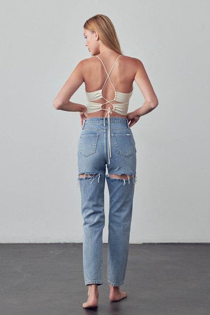 Stylish Insane Gene Straight Ankle Jeans with a relaxed fit and distressed details, perfect for casual wear