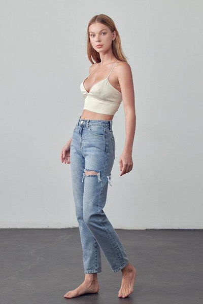Model wearing Insane Gene Straight Ankle Jeans with a cropped top and a relaxed fit