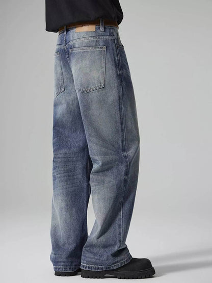 Side view of Wide Leg Washed Jeans featuring a relaxed fit and classic denim style
