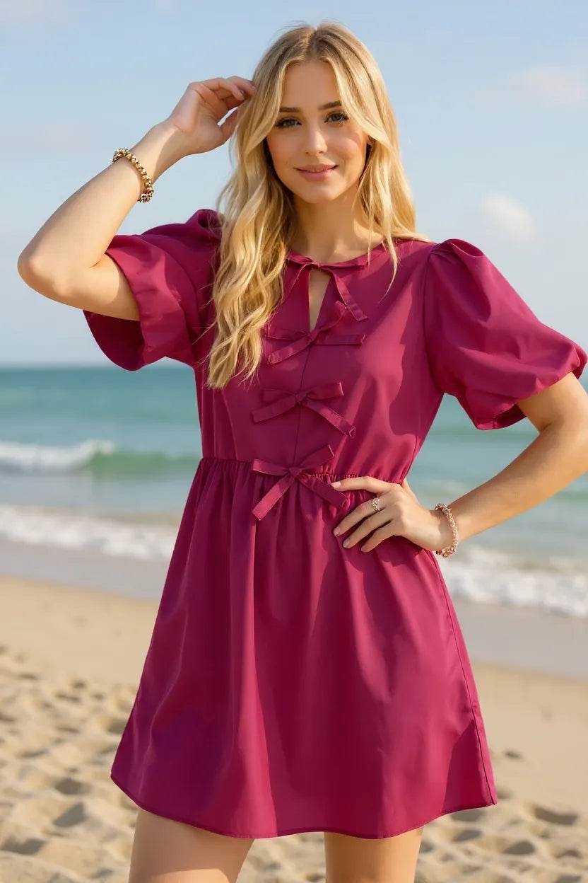 Ruched Puff Sleeve Mini Dress - Magenta Tie Waist Bow Detail - Fashions Envy