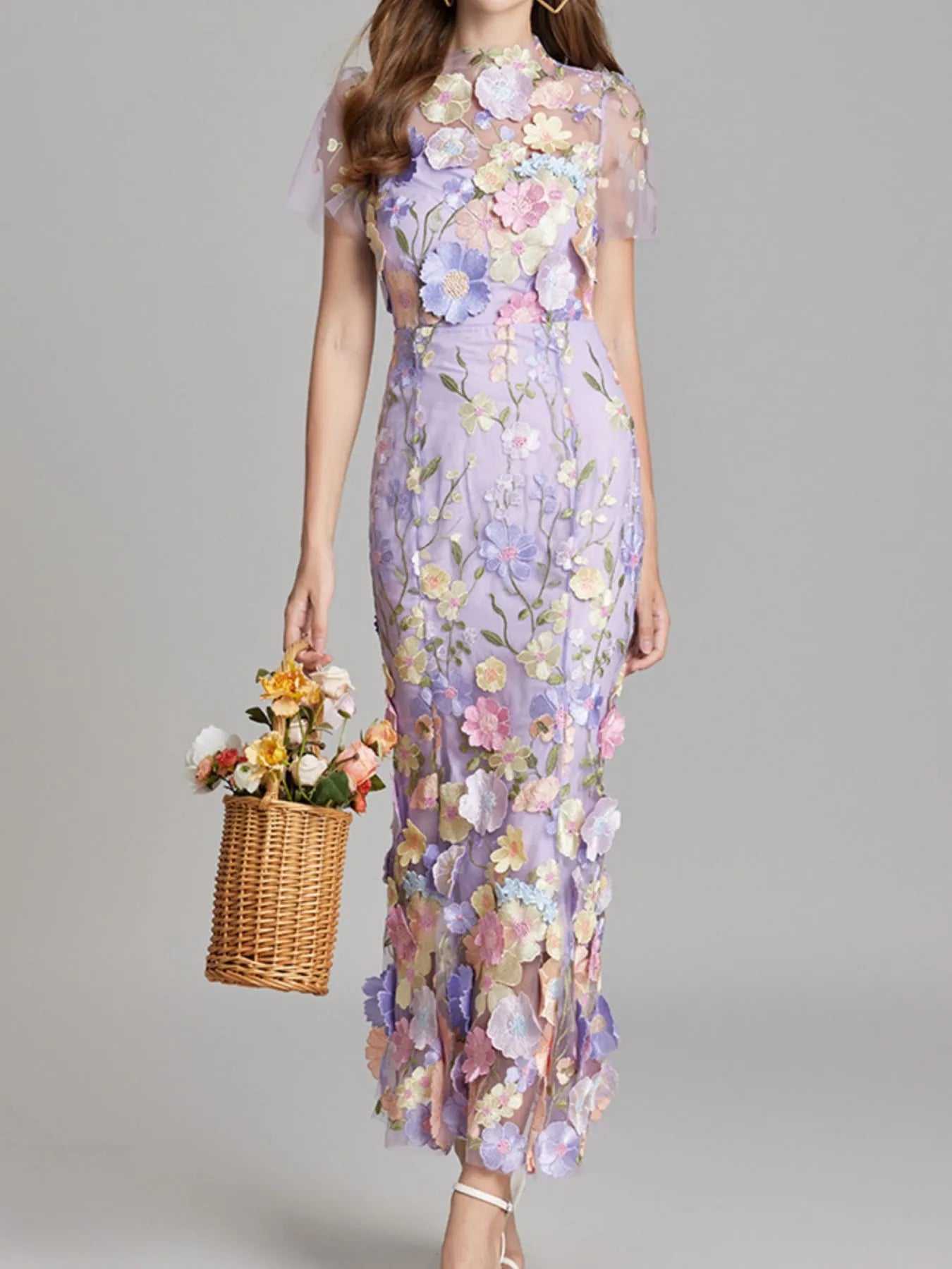 Trendsi lilac floral embroidered Lined Evening Gown with sheer short sleeves, fitted silhouette, model holding wicker flower basket